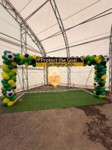 balloon soccer goal with signage for corporate safety event
