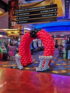 Balloon helmet tunnel entrance decor