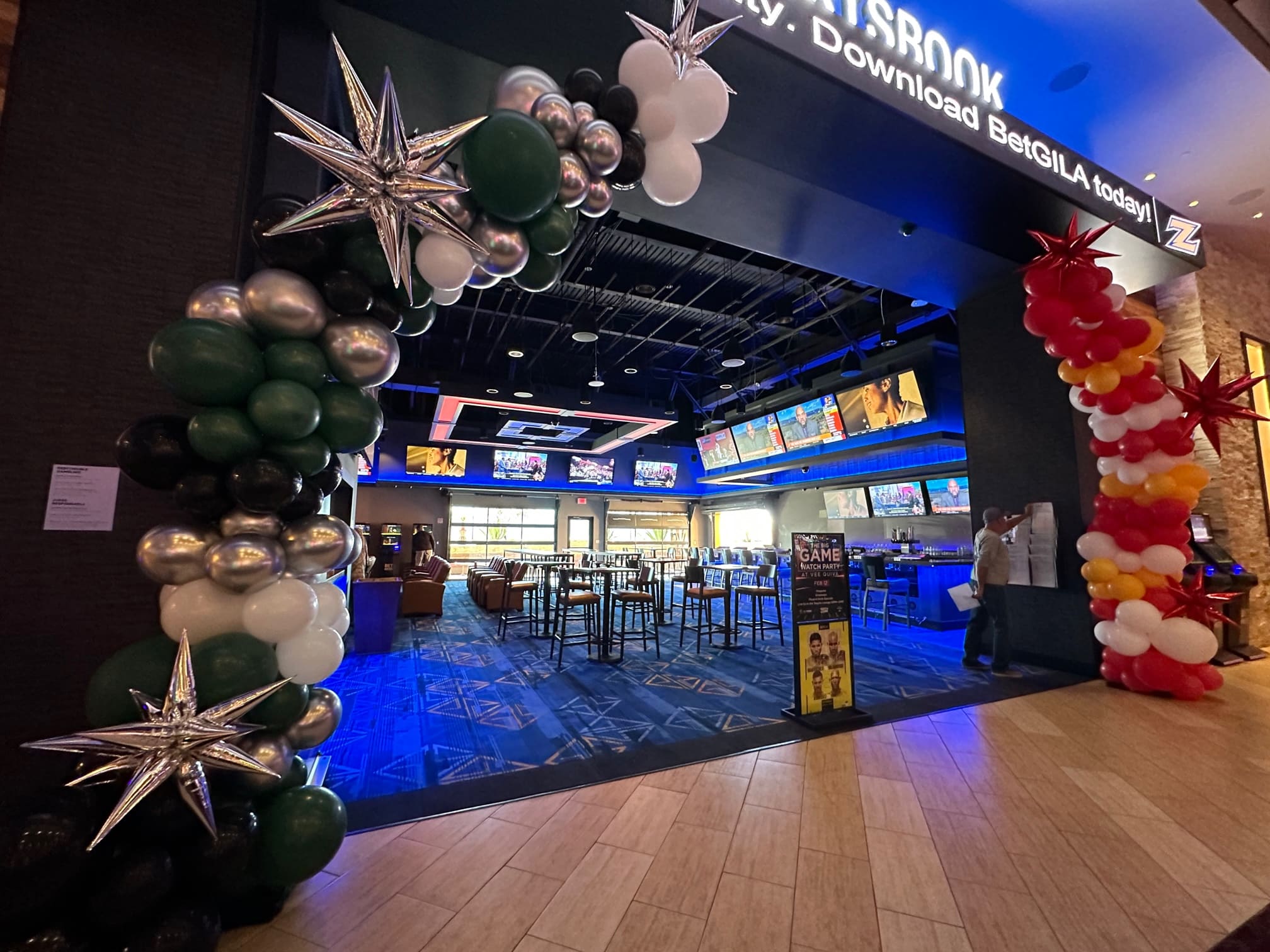 team Balloon Arches at an entrance of casino sports betting