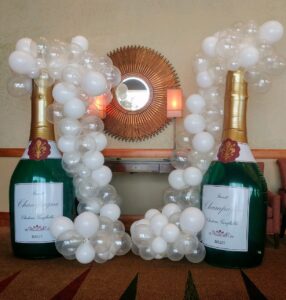 giant champagne bottles with Balloon bubbles coming out