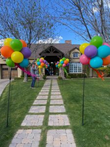 Balloon topiaries lining a walkway