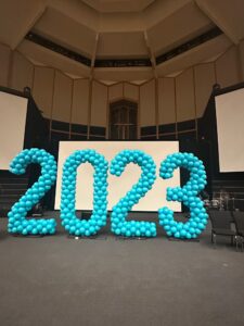 giant numbers on a stage for graduation