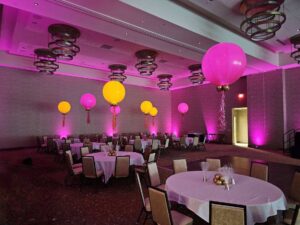 lighted Balloon Centerpieces provide a warm glow in the banquet room