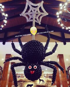 giant Balloon spider suspended from ceiling