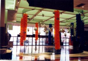 Balloon Columns hung from the ceiling fill the space with color