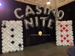 casino theme Balloon decor with giant playing cards made of Balloons