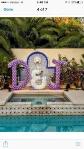 bride and groom initials by the pool