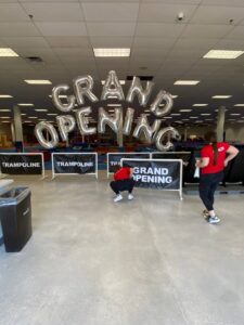 Grand Opening balloon letter arch