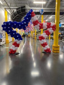 Walk thru star shaped balloon arch done patriotic