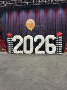 9' balloon numbers for a graduation ceremony and magic arch columns
