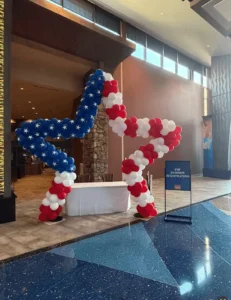 Walk thru patriotic themed balloon star sculpture